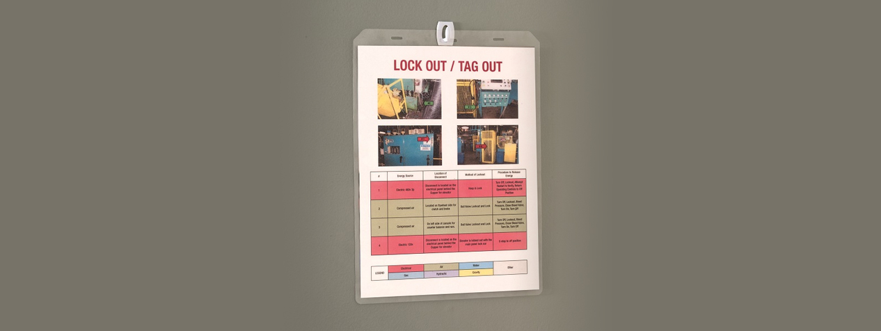 1135_v2_Lockout_Tagout_sign_hanging_from_white_plastic_hook